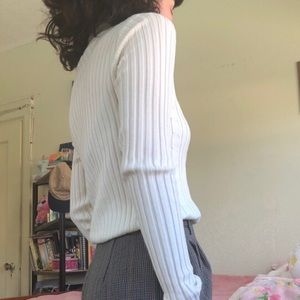 White ribbed turtleneck sweater
